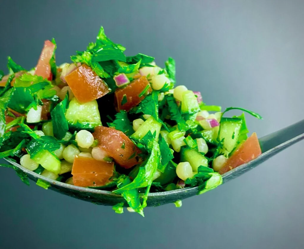 Close up of Tabbouleh Salad on a spoon
