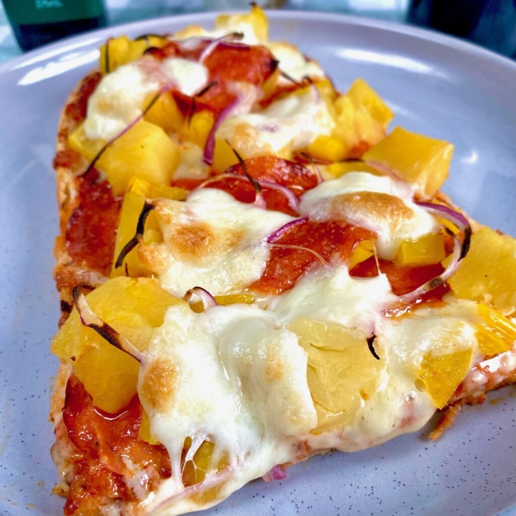 Vegetarian Turkish Bread Pizza with Roasted Peppers and Pineapple close up