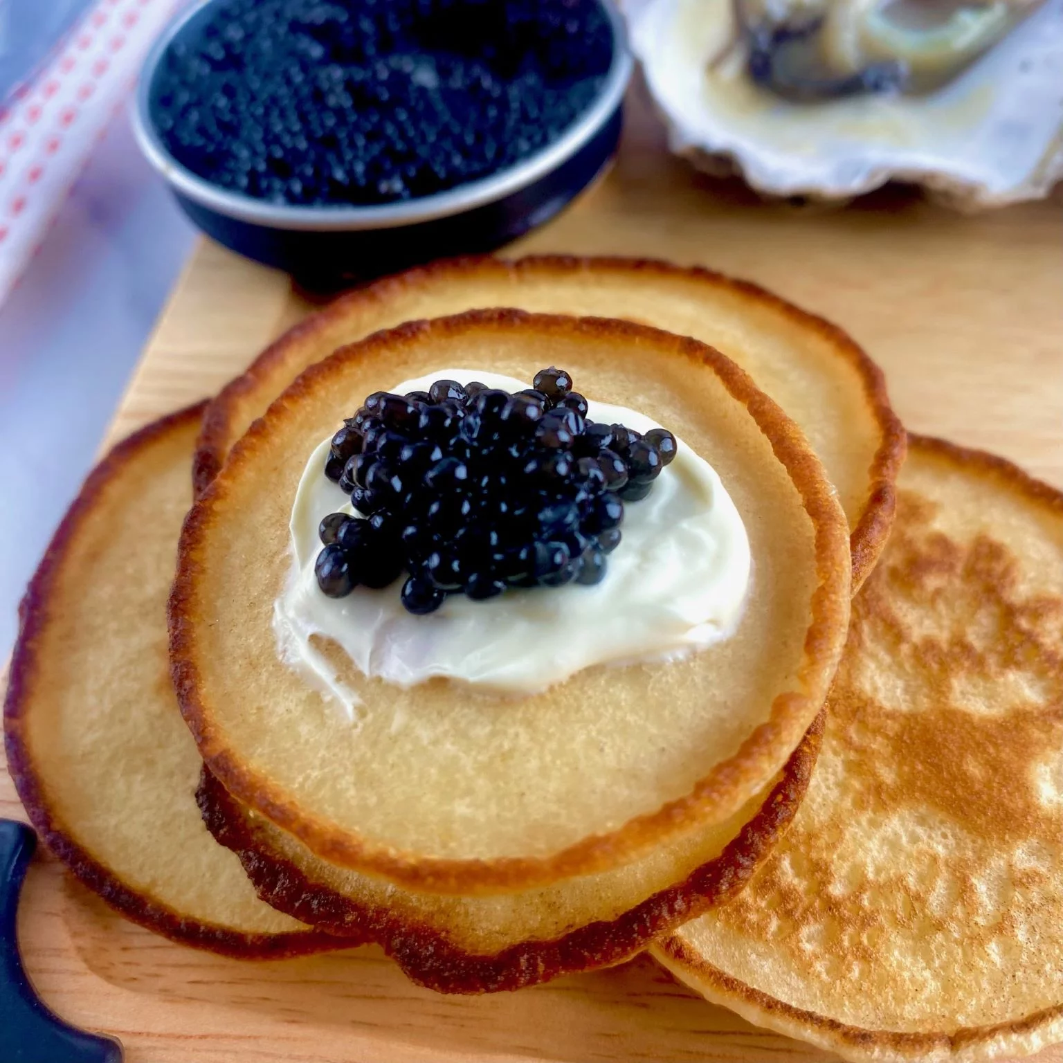 Caviar Bump with Blinis