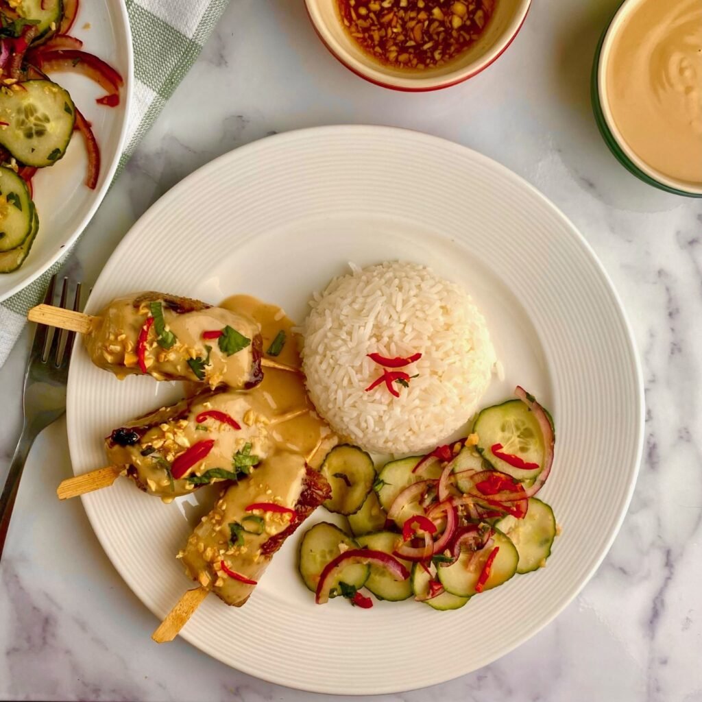 Beef Skewers with Peanut Sauce and Cucumber Salad