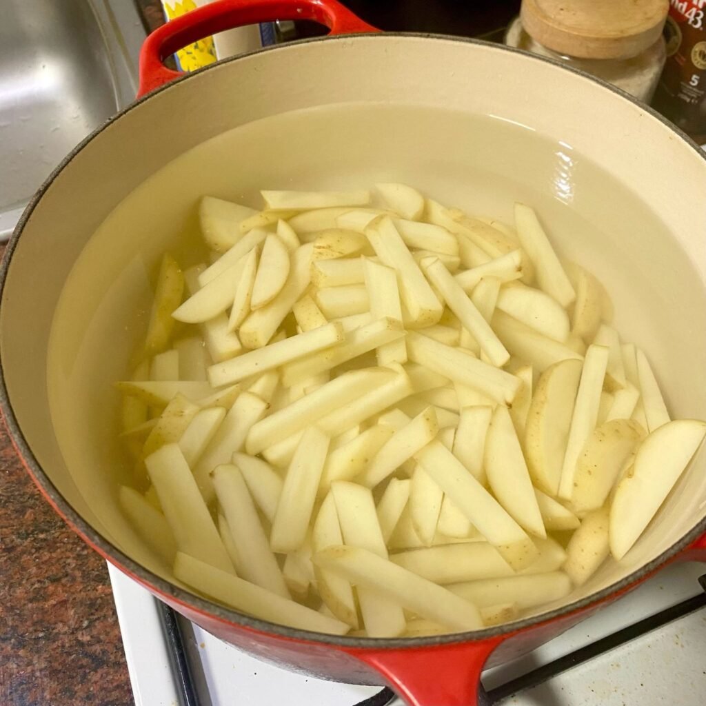 The Perfect Homemade Fries parboiling