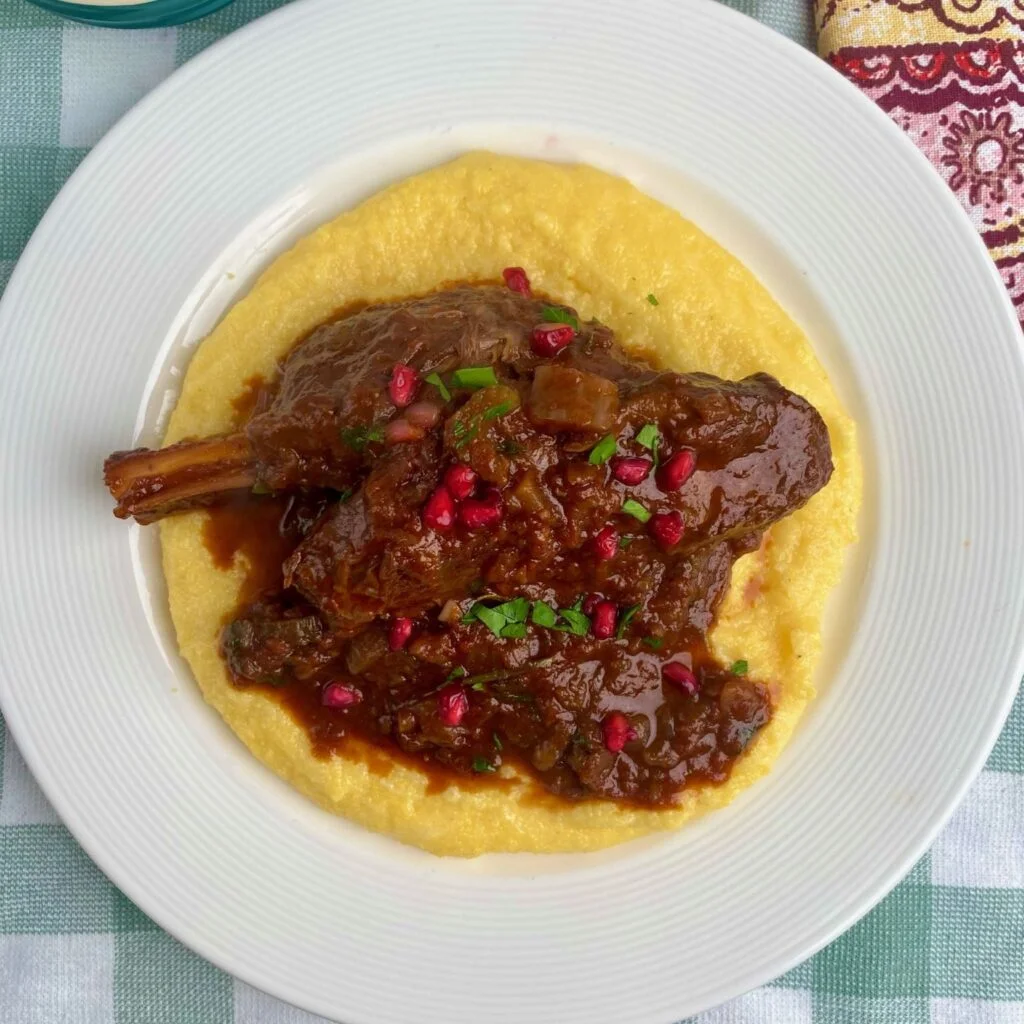 Braised Lamb Shanks with Grits and Pomegranate