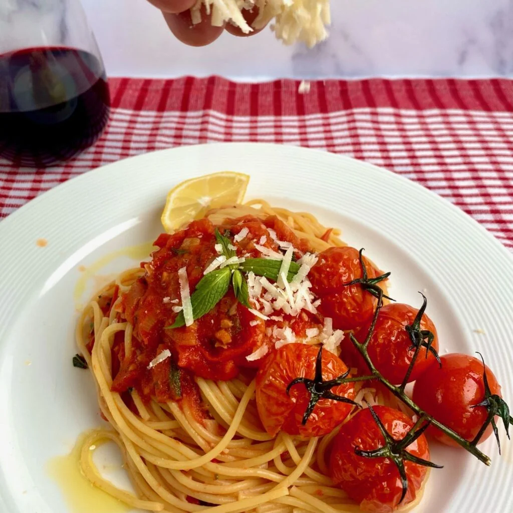 Heirloom Tomato Pasta with Mint, Truss Tomatoes, and Parmesan Cheese