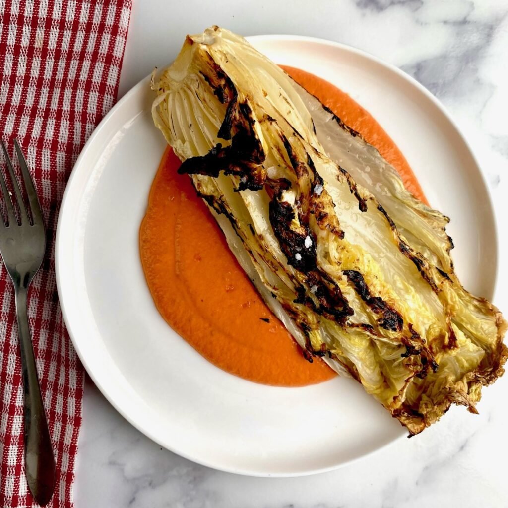 Fire Roasted Cabbage with Red Pepper and Yoghurt Sauce