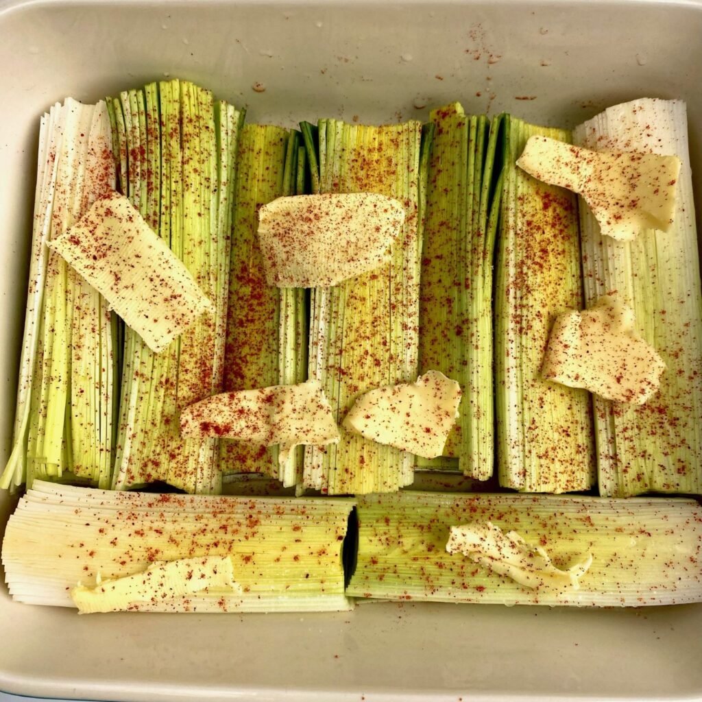 Braised Leeks in baking pan with seasoning