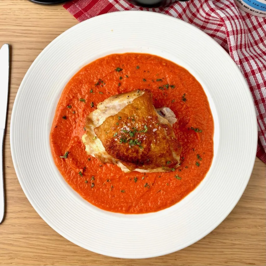 Chicken with Romesco Sauce on plate