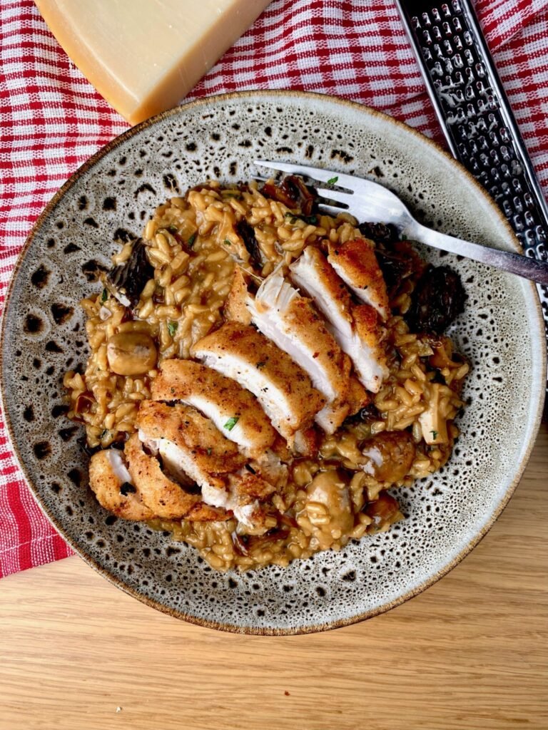 Sliced Chicken on a Mushroom Risotto