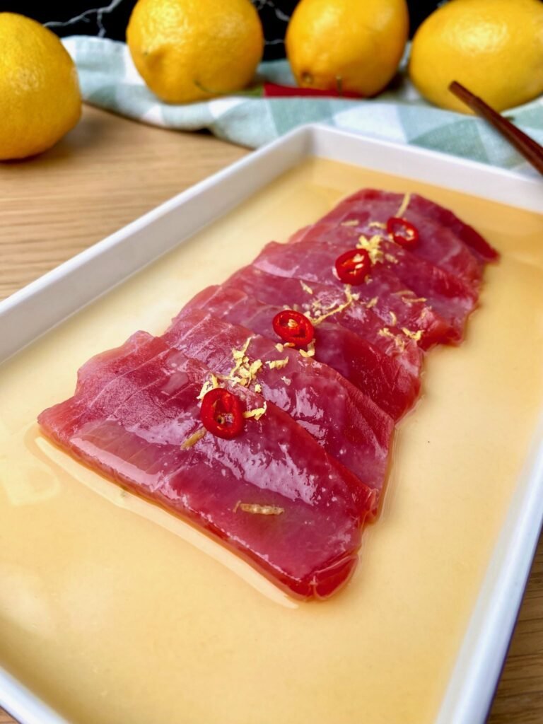 Slices raw Tuna with Lemon Zest and Chili