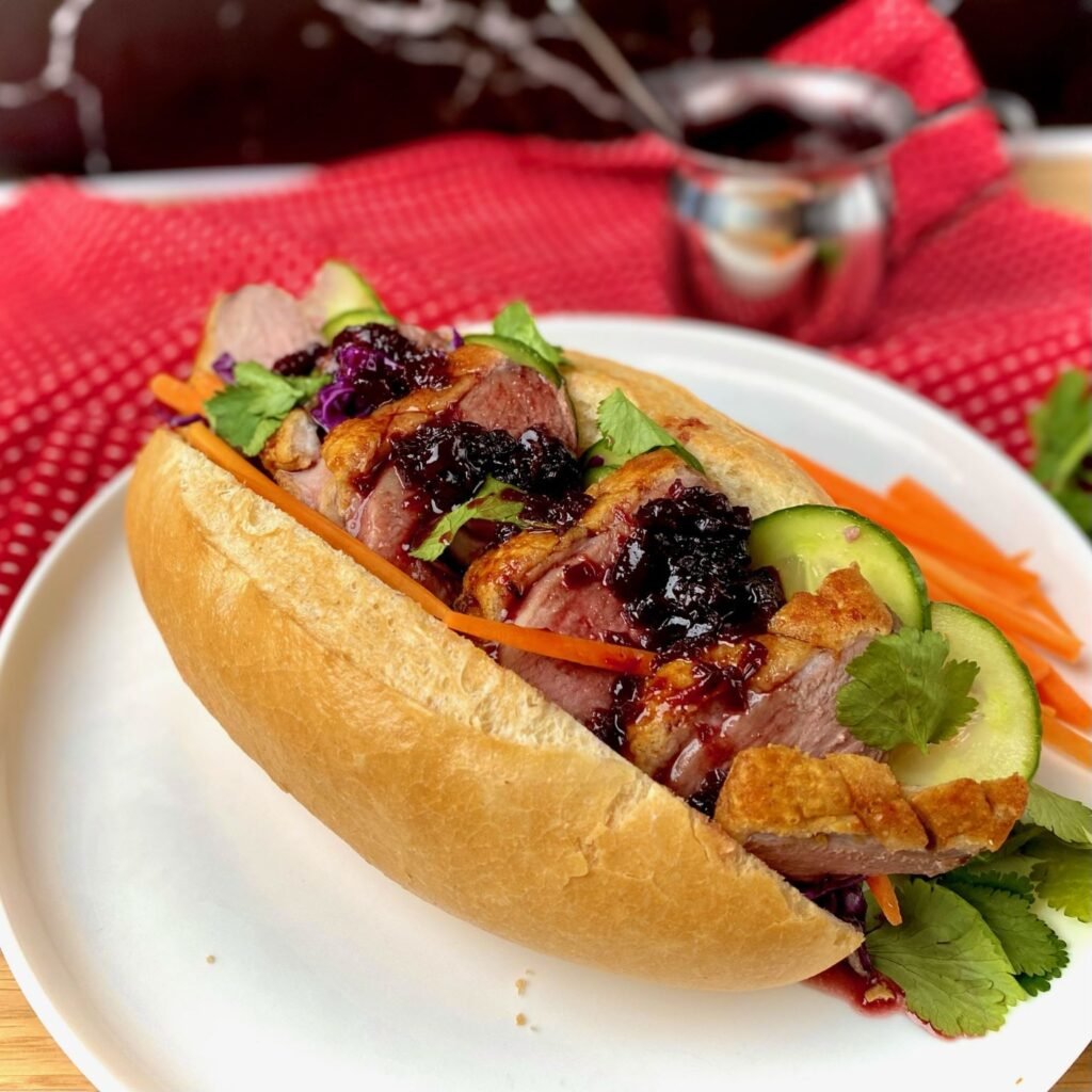 Making Duck Banh Mi with Cherry Sauce Sandwich