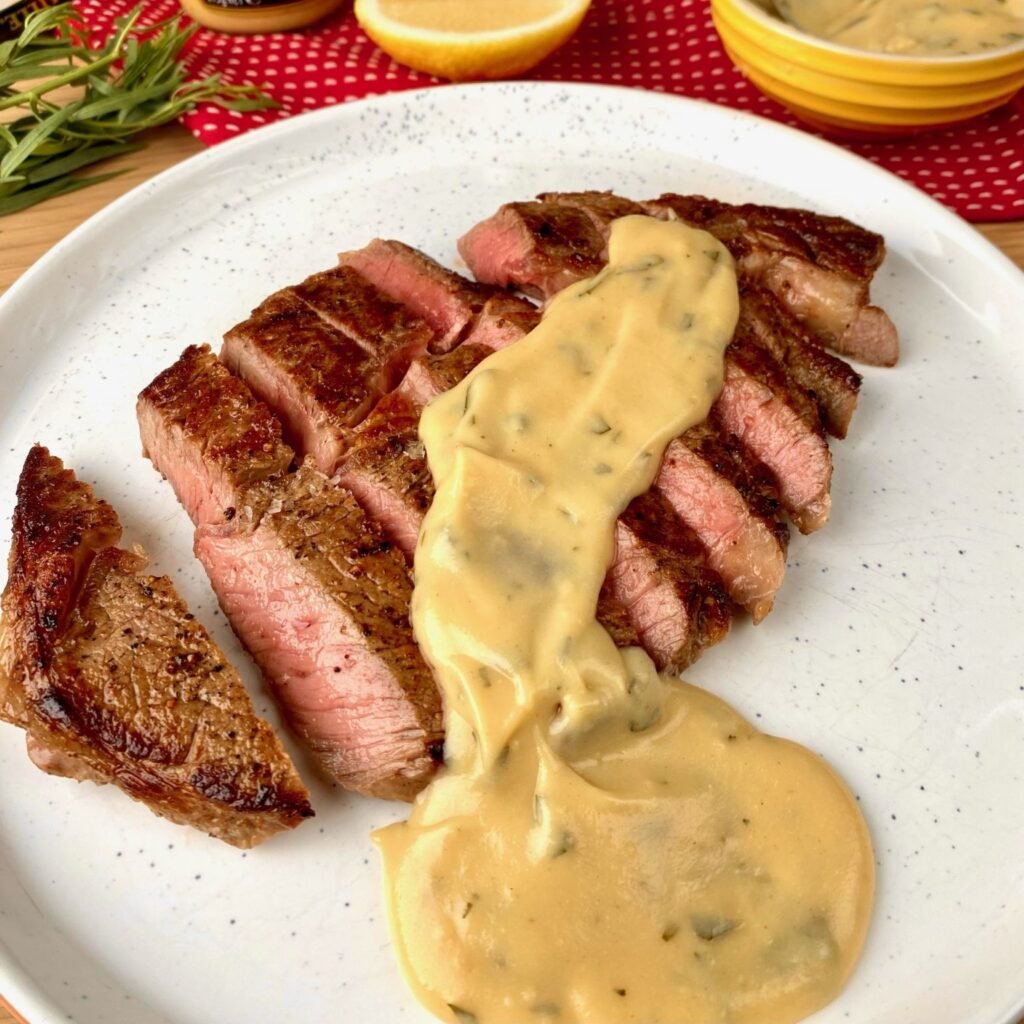 Sliced Steak topped with Bearnaise Sauce