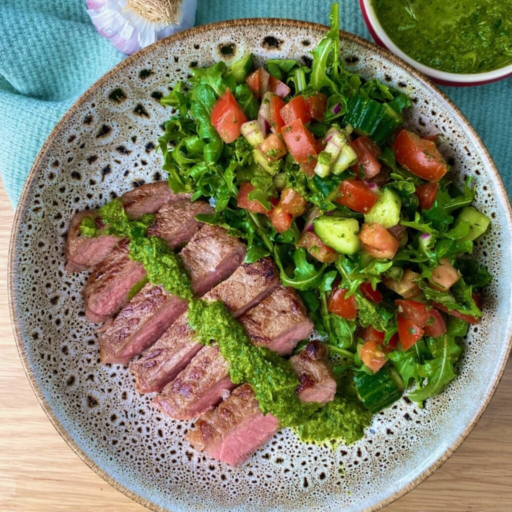 Plate of Grilled Steak with Zhoug Sauce