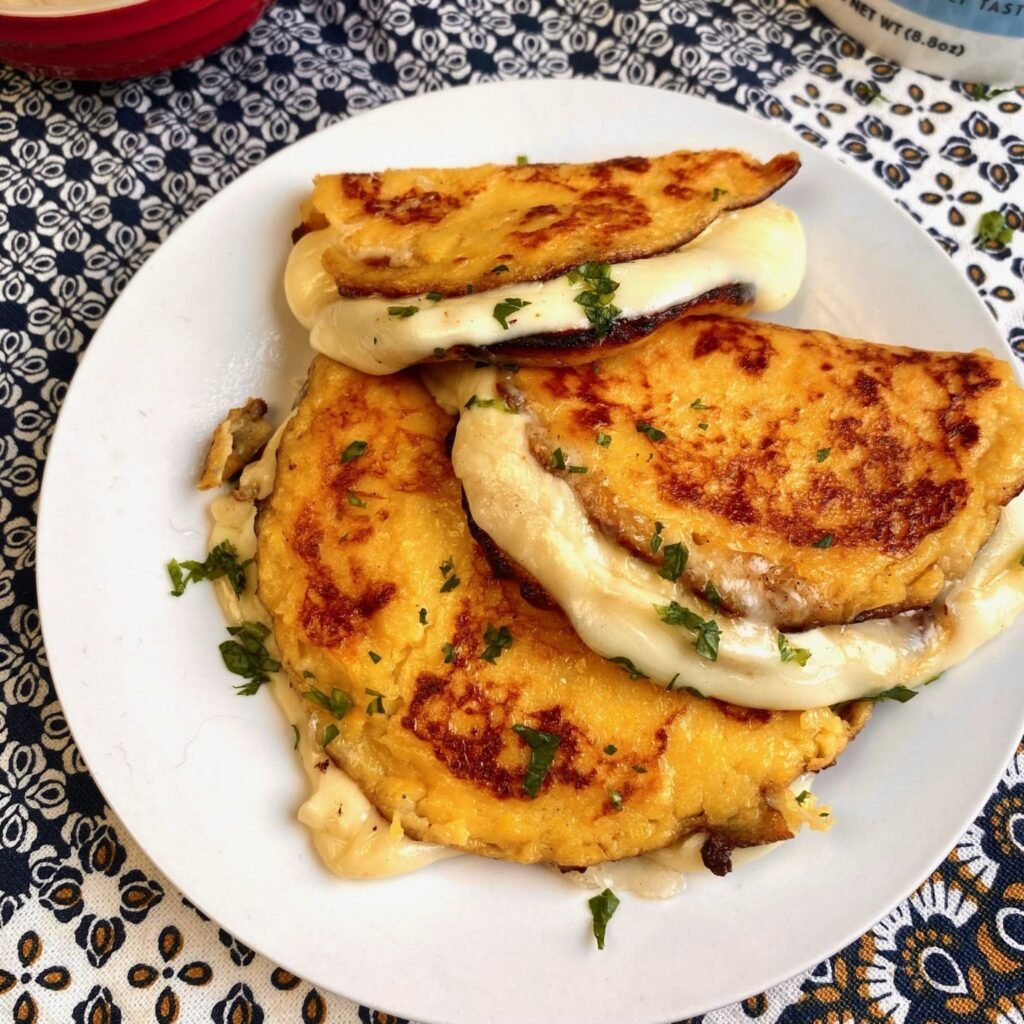 Corn Cachapas with Cheese on plate